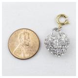 Nolan Miller White Rhinestone Accented Heart silver tone Base Metal charm.