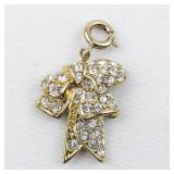 Nolan Miller Rhinestone Accented gold tone base metal charm.