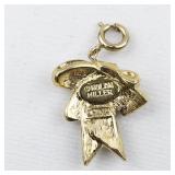 Nolan Miller Rhinestone Accented gold tone base metal charm.