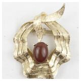 Textured Red Cabochon Gemstone Gold Tone Base Metal Brooch .