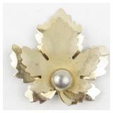 Layered Leaf Gold Tone Base Metal Brooch .