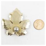 Layered Leaf Gold Tone Base Metal Brooch .