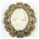 Vintage Carved White Cameo Gold Tone Base Metal Brooch .