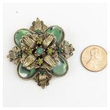 Green Rhinestone Flower Brooch Gold Tone Base Metal Brooch .