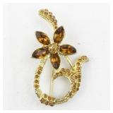 Orange Rhinestone Swirl Flower Gold Tone Base Metal Brooch .