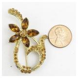 Orange Rhinestone Swirl Flower Gold Tone Base Metal Brooch .