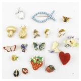 Group of Eighteen  Base Metal Brooches.