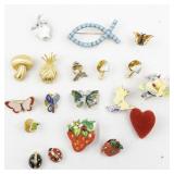 Group of Eighteen  Base Metal Brooches.