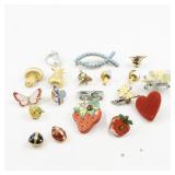 Group of Eighteen  Base Metal Brooches.