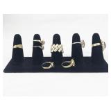 Set of Eight Gold Tone Base Metal Rings . Size 7.75-8.5.