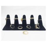 Set of ten  Gold Tone Base Metal Rings . Size 6.75-7.25.