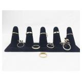 Set of ten  Gold Tone Base Metal Rings . Size 6.75-7.25.