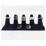 Set of Seven Gold Tone Base Metal Rings . Size 6-6.5.