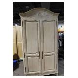 Elegant Vintage Armoire with Intricate Carved Detailing