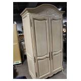 Elegant Vintage Armoire with Intricate Carved Detailing