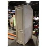 Elegant Vintage Armoire with Intricate Carved Detailing