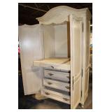 Elegant Vintage Armoire with Intricate Carved Detailing