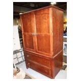Sturdy Wooden Armoire with Shelves and Drawers