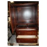 Sturdy Wooden Armoire with Shelves and Drawers