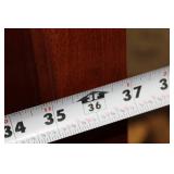 Sturdy Wooden Armoire with Shelves and Drawers