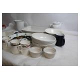 Mixed Set of Porcelain Kitchenware including Plates, Bowls, and Mugs