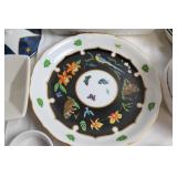 Mixed Set of Porcelain Kitchenware including Plates, Bowls, and Mugs