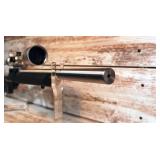 Magnum Research .22 WMR Heavy-barrel Competition Target Rifle with Hogue Stock and Nc Star Scope