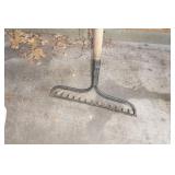 Shelves with Contents - Shovels, Paint, Rakes, Cords