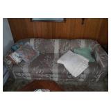 Sofa with Pillows and Throw Blanket