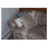 Sofa with Pillows and Throw Blanket