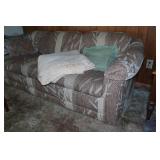 Sofa with Pillows and Throw Blanket