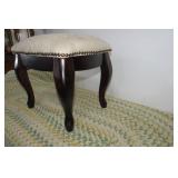 Wood and upholstered foot rest...