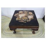 Upholstered carved foot rest, needs...