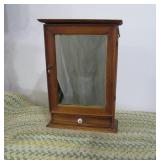 Mirrored medicine cabinet with draw...