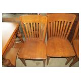 (6) Wood chairs including one capta...