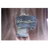 Brown fur coat and black one is fur...