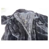 Brown fur coat and black one is fur...