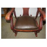 Oversized carved leather seat rocke...