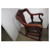 Oversized carved leather seat rocke...