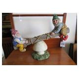 Resin gnomes on teeter-totter yard ...
