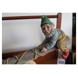 Resin gnomes on teeter-totter yard ...