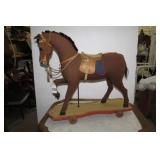 Burlap horse on wood base with whee...