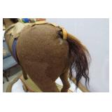 Burlap horse on wood base with whee...