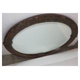 Ornate framed mirror...