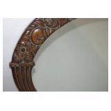 Ornate framed mirror...