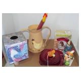 Rooster items with red dishes...