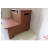 Gnome and elf sitting on steps, one...