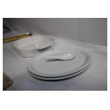 Collection of Ceramic Baking Dishes and Cutting Board