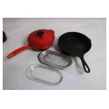 Set of Cast Iron Skillet, Enamel Covered Pot, and Glass Cooking Trays