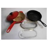 Set of Cast Iron Skillet, Enamel Covered Pot, and Glass Cooking Trays